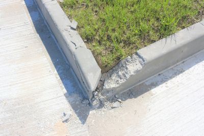 Get a Broken Curb Repaired!